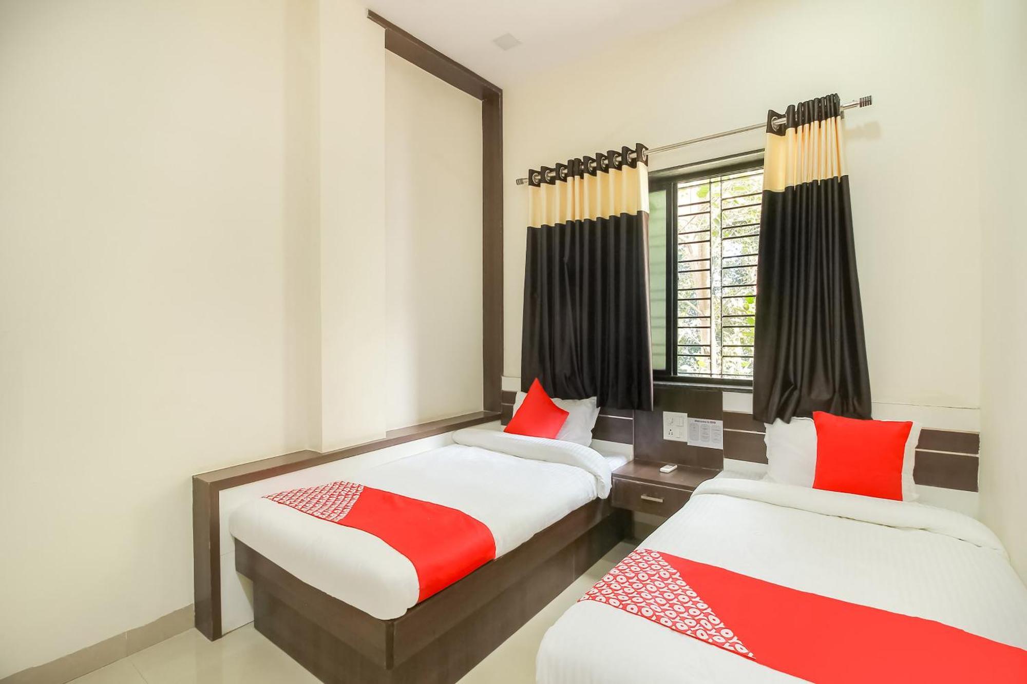 Hotel O Unique Inn Dhule Buitenkant foto