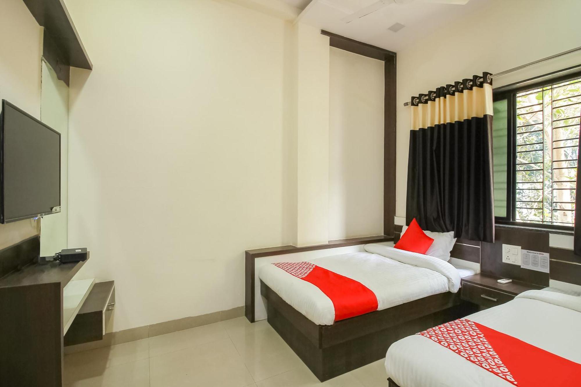 Hotel O Unique Inn Dhule Buitenkant foto